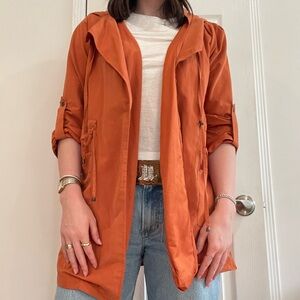 Orange lightweight trench coat with hood